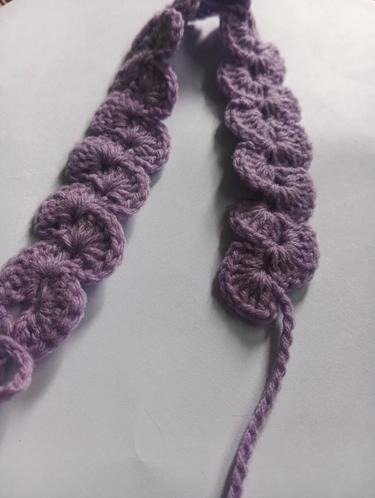Student made scalloped strip pattern