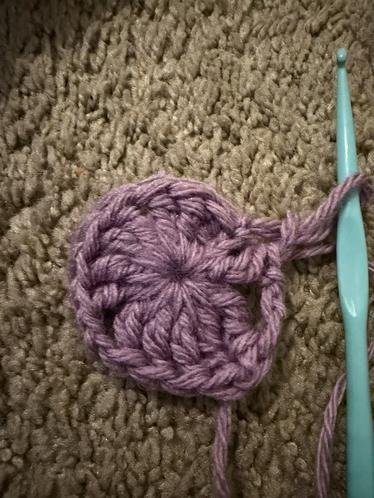 Student practicing crochet circle