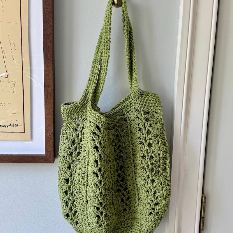 Student made green mesh tote bag